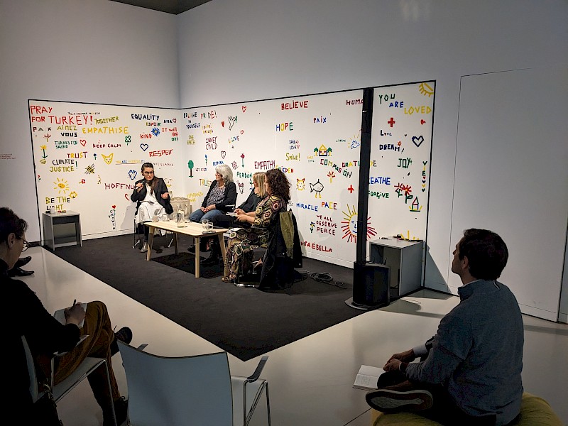 People moderating a round table discussion